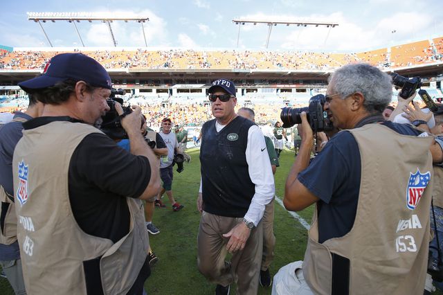 Rex Ryan leaves the field at  Sun Life Stadium; the Jets won the game over the Miami Dolphins, but it was too little, too late. <br/>